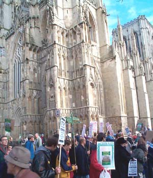 Demonstrators pass York Minster
